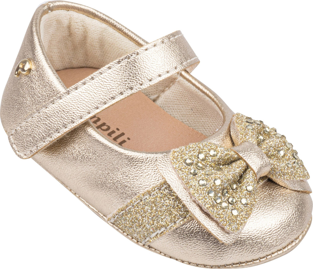 Golden booties with a bow with crystals