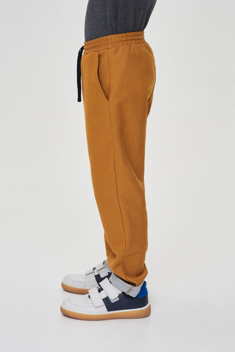 Curry knitted denim trousers