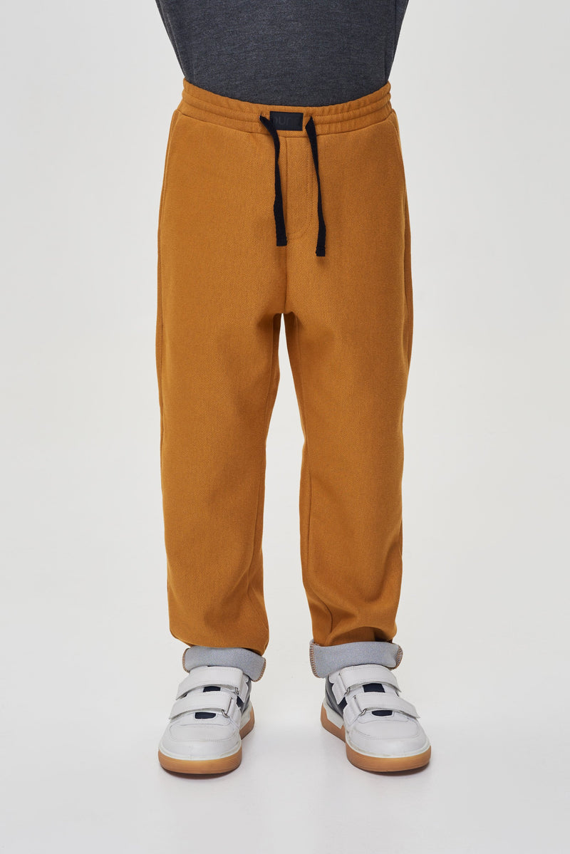 Curry knitted denim trousers